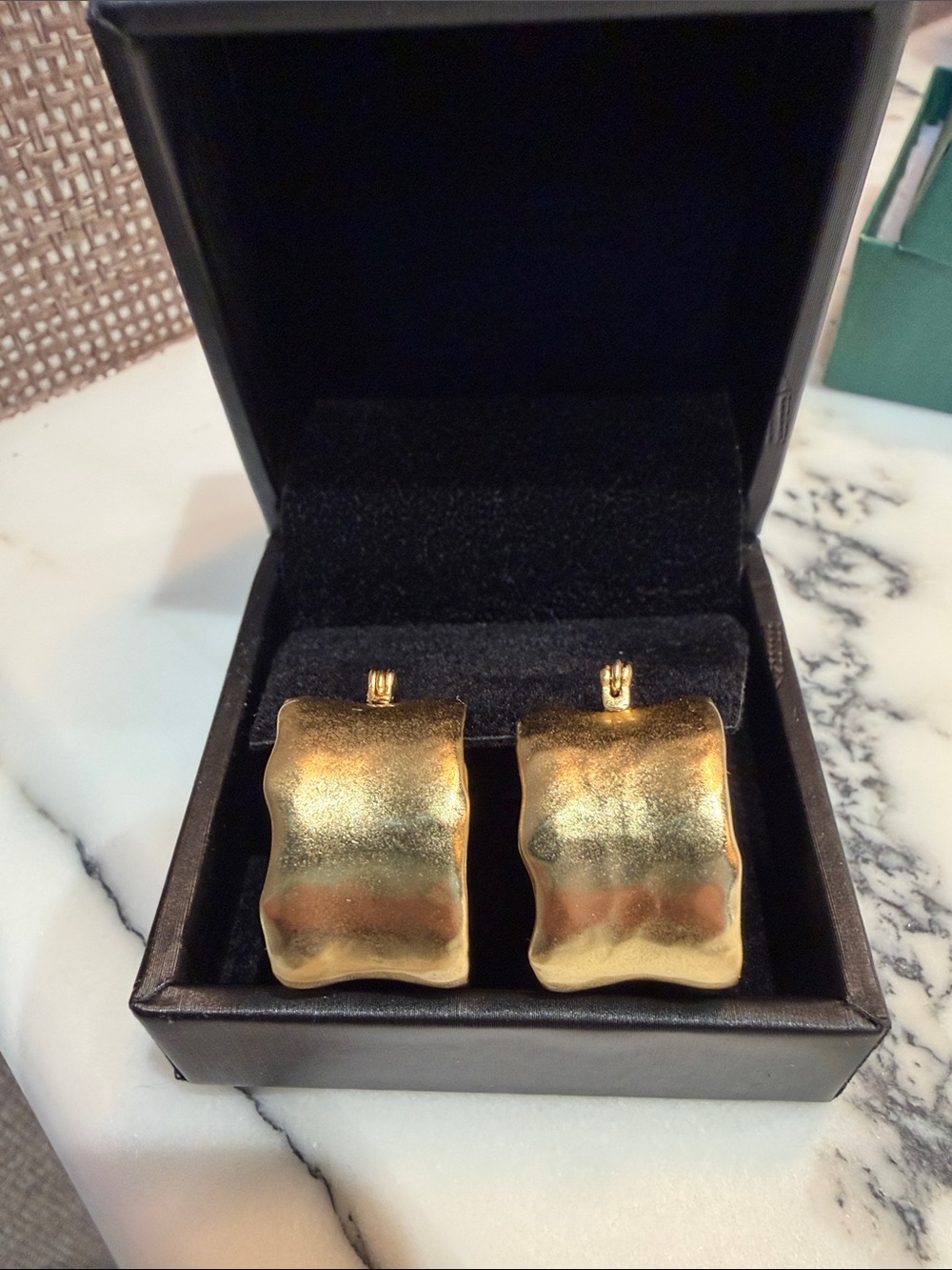 Gold Tone Wavy pierced hoop Earrings